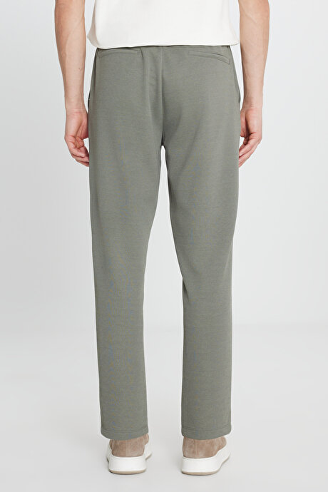 Pamuklu Standart Fit Normal Kesim Beli Lastikli Diagonal Desenli Örme Haki Pantolon resmi