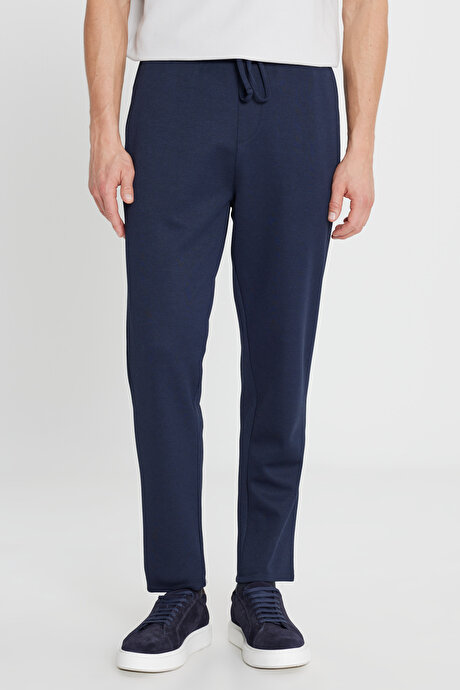 Pamuklu Standart Fit Normal Kesim Beli Lastikli Diagonal Desenli Örme Lacivert Örme Pantolon resmi