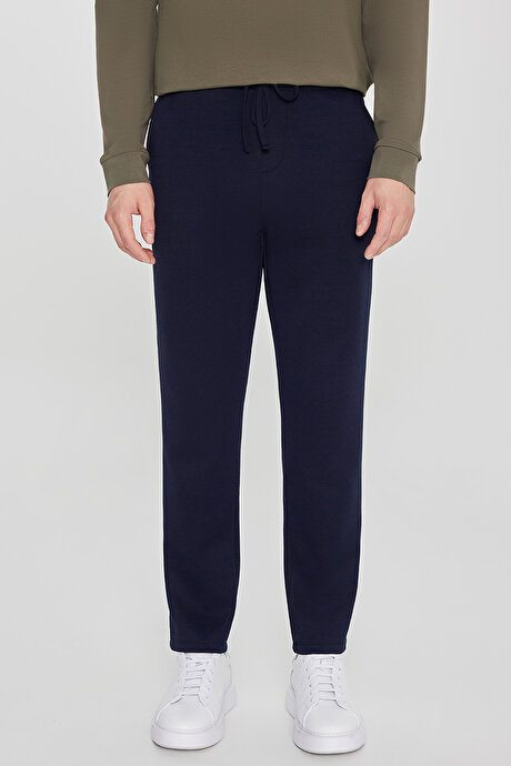 Pamuklu Standart Fit Normal Kesim Beli Lastikli Diagonal Desenli Örme Lacivert Pantolon resmi