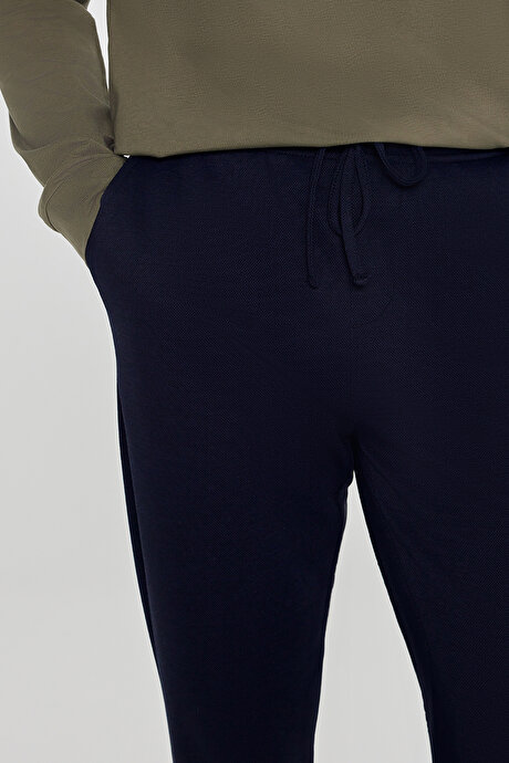 Pamuklu Standart Fit Normal Kesim Beli Lastikli Diagonal Desenli Örme Lacivert Pantolon resmi