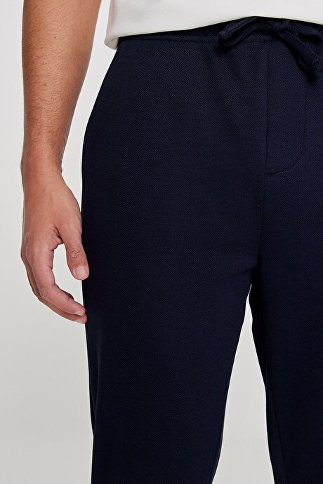 Pamuklu Standart Fit Normal Kesim Beli Lastikli Diagonal Desenli Örme Lacivert Pantolon resmi