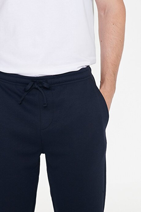 Pamuklu Standart Fit Normal Kesim Beli Lastikli Diagonal Desenli Örme Lacivert Pantolon resmi