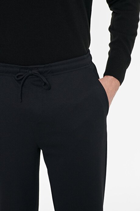 Pamuklu Standart Fit Normal Kesim Beli Lastikli Diagonal Desenli Örme Siyah Pantolon resmi