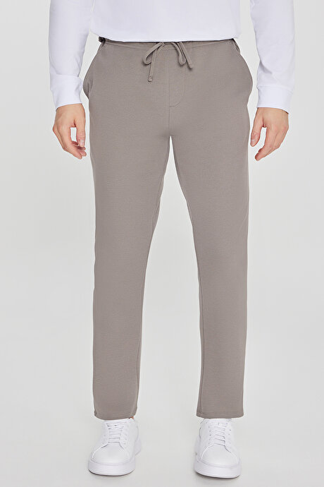 Pamuklu Standart Fit Normal Kesim Beli Lastikli Diagonal Desenli Örme Vizon Pantolon resmi