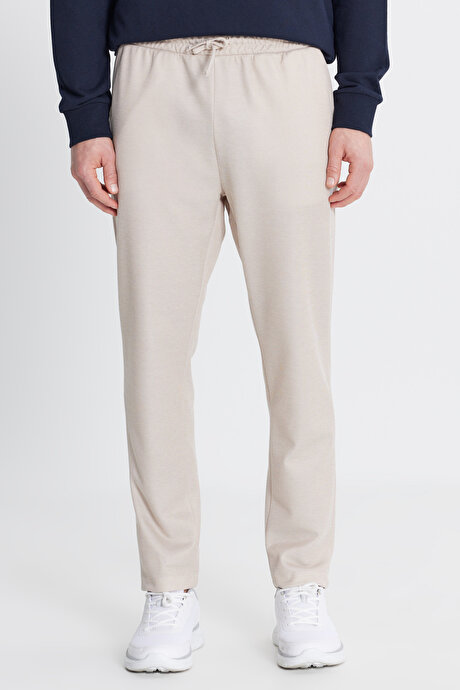 Pamuklu Standart Fit Normal Kesim Beli Bağlamalı Yan Cepli Jakarlı Bej Eşofman Altı resmi