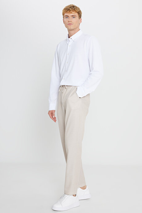 Pamuklu Standart Fit Normal Kesim Beli Bağlamalı Yan Cepli Jakarlı Bej Eşofman Altı resmi