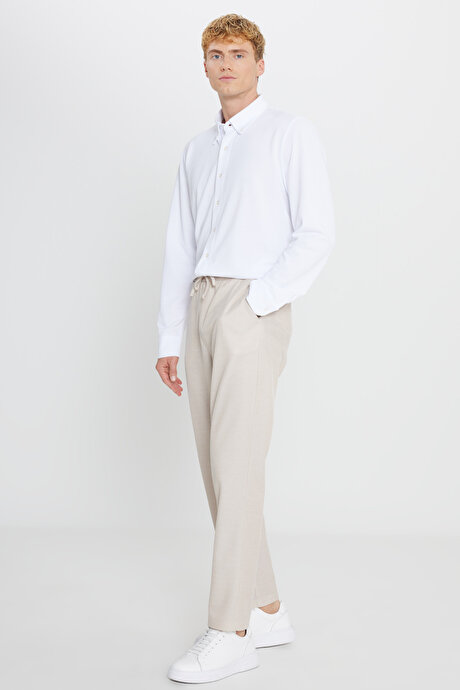 Pamuklu Standart Fit Normal Kesim Beli Bağlamalı Yan Cepli Jakarlı Bej Eşofman Altı resmi