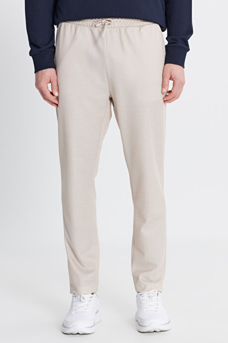 Pamuklu Standart Fit Normal Kesim Beli Bağlamalı Yan Cepli Jakarlı Bej Eşofman Altı resmi