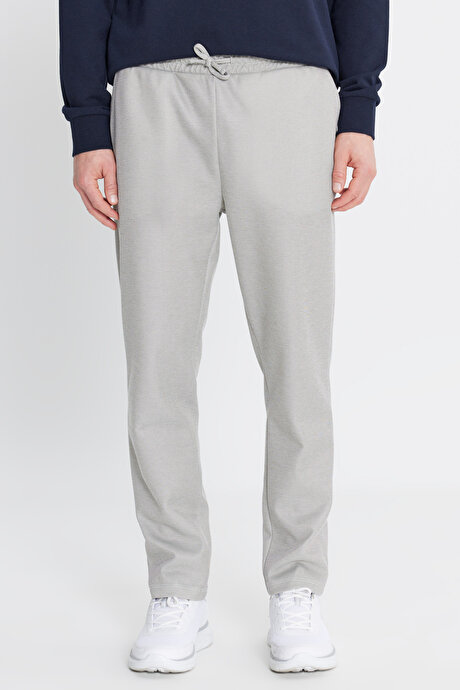 Pamuklu Standart Fit Normal Kesim Beli Bağlamalı Yan Cepli Jakarlı Haki Melanj Eşofman Altı resmi