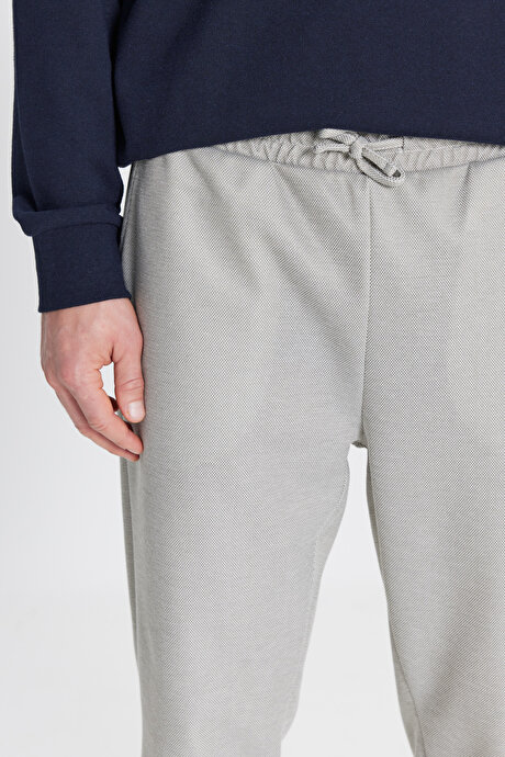 Pamuklu Standart Fit Normal Kesim Beli Bağlamalı Yan Cepli Jakarlı Haki Melanj Eşofman Altı resmi