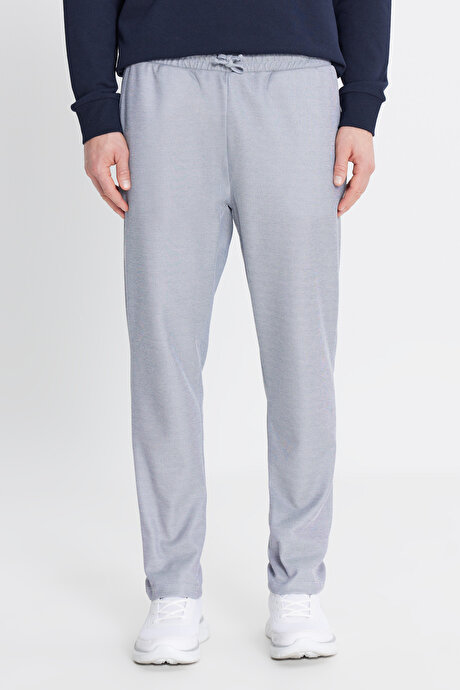 Pamuklu Standart Fit Normal Kesim Beli Bağlamalı Yan Cepli Jakarlı Lacivert Melanj Eşofman Altı resmi