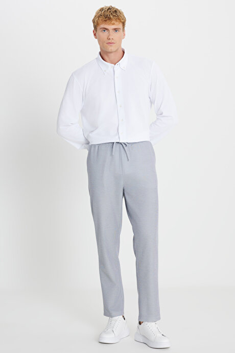 Pamuklu Standart Fit Normal Kesim Beli Bağlamalı Yan Cepli Jakarlı Lacivert Melanj Eşofman Altı resmi