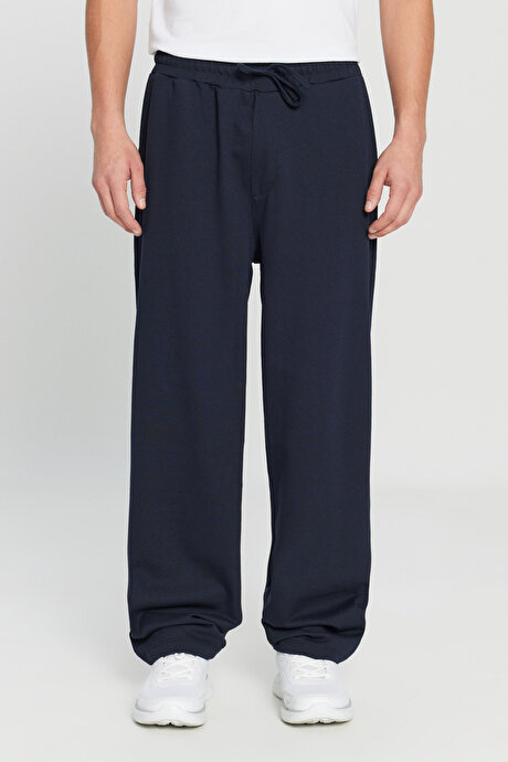 Pamuklu Baggy Fit Rahat Kesim Beli Bağlamalı Yan Cepli Örme Lacivert Eşofman Altı resmi