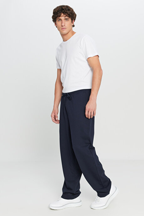 Pamuklu Baggy Fit Rahat Kesim Beli Bağlamalı Yan Cepli Örme Lacivert Eşofman Altı resmi