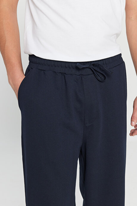 Pamuklu Baggy Fit Rahat Kesim Beli Bağlamalı Yan Cepli Örme Lacivert Eşofman Altı resmi