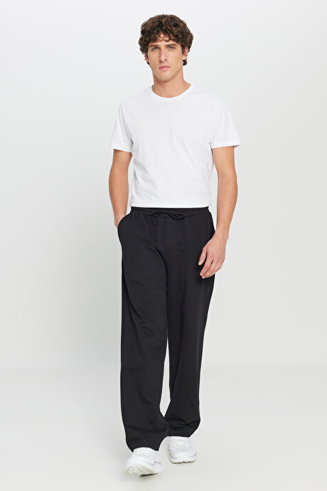 Pamuklu Baggy Fit Rahat Kesim Beli Bağlamalı Yan Cepli Örme Siyah Eşofman Altı resmi