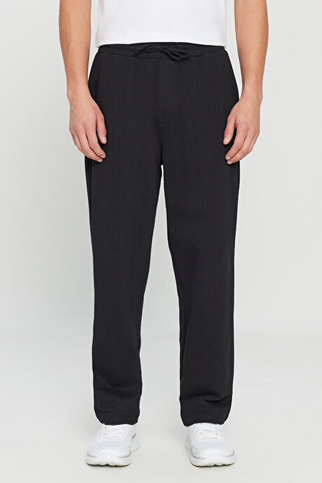 Pamuklu Baggy Fit Rahat Kesim Beli Bağlamalı Yan Cepli Örme Siyah Eşofman Altı resmi