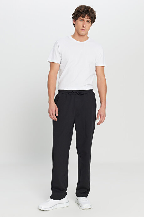 Pamuklu Baggy Fit Rahat Kesim Beli Bağlamalı Yan Cepli Örme Siyah Eşofman Altı resmi