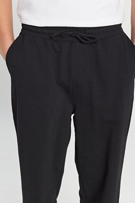 Pamuklu Baggy Fit Rahat Kesim Beli Bağlamalı Yan Cepli Örme Siyah Eşofman Altı resmi