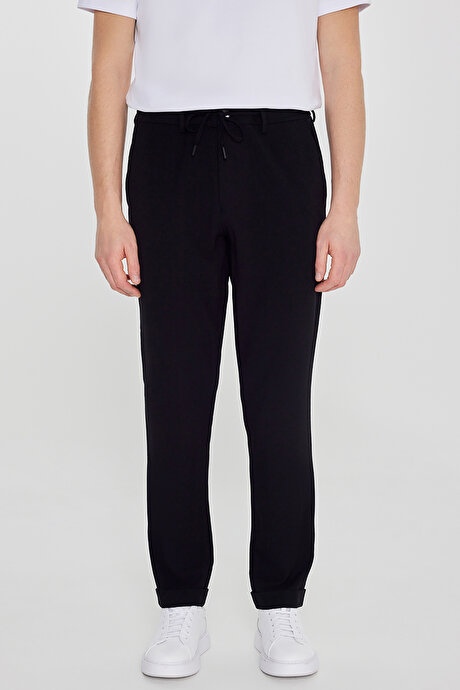 Slim Fit Dar Kesim Beli Bağlamalı Yan Cepli Gofre Desenli Esnek Siyah Pantolon resmi