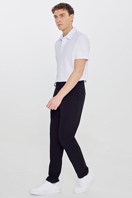 Slim Fit Dar Kesim Beli Bağlamalı Yan Cepli Gofre Desenli Esnek Siyah Pantolon resmi