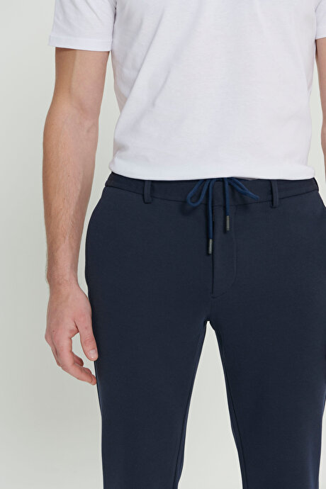 360 Derece Her Yöne Esneyen Slim Fit Dar Kesim Diagonal Desenli Beli Bağlamalı Örme Lacivert Pantolon resmi