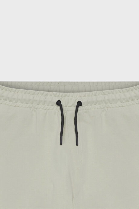 Standart Fit Beli ve Paçası Lastikli Rahat Spor Bej Eşofman Altı resmi
