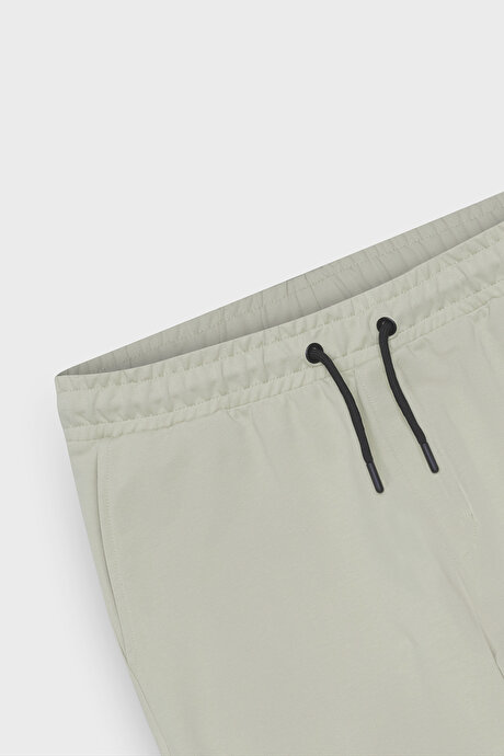 Standart Fit Beli ve Paçası Lastikli Rahat Spor Bej Eşofman Altı resmi