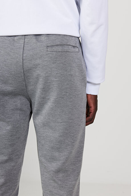 Standart Fit Beli ve Paçası Lastikli Rahat Spor Gri Melanj Eşofman Altı resmi