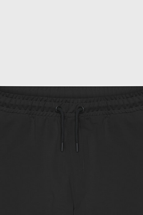 Standart Fit Beli ve Paçası Lastikli Rahat Spor Siyah Eşofman Altı resmi