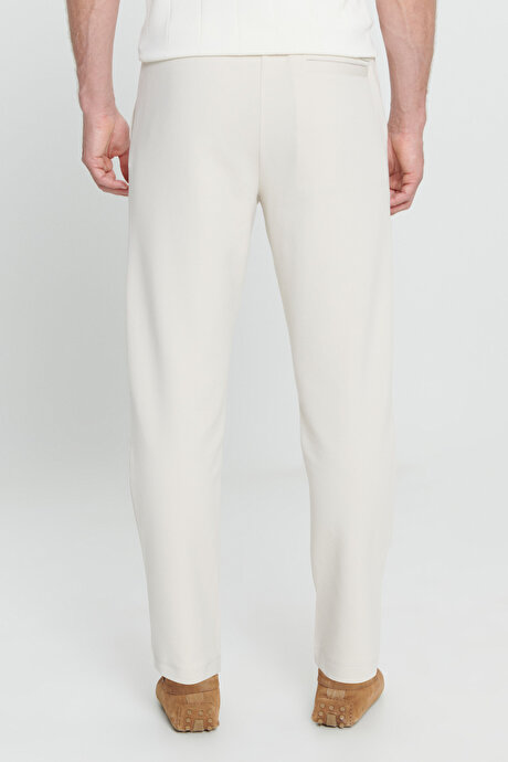 Pamuklu Slim Fit Dar Kesim Yan Cepli Normal Bel Esnek Örme Bej Örme Pantolon resmi