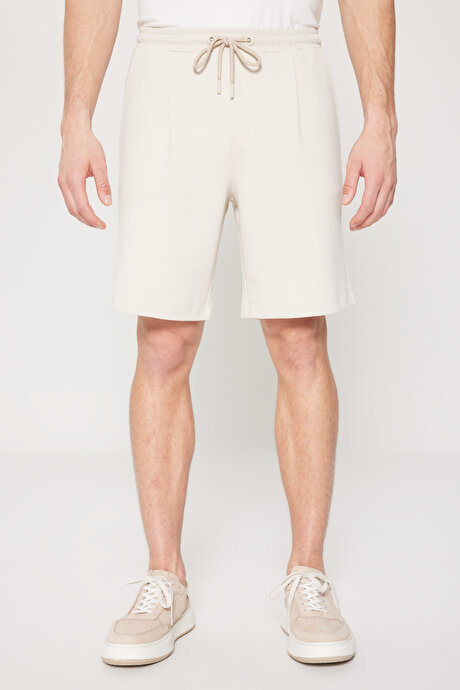 Pamuklu Slim Fit Dar Kesim Yan Cepli Esnek Örme Bej Şort resmi