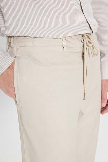 Pamuklu Slim Fit Dar Kesim Diagonal Desenli Pileli Yan Cep Casual Bej Pantolon resmi